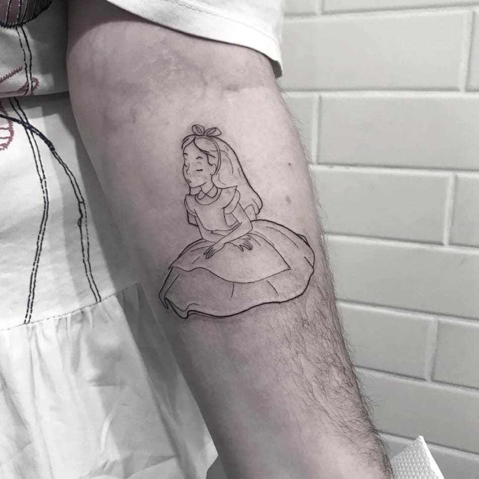 Alice in wonderland alice arm tattoo