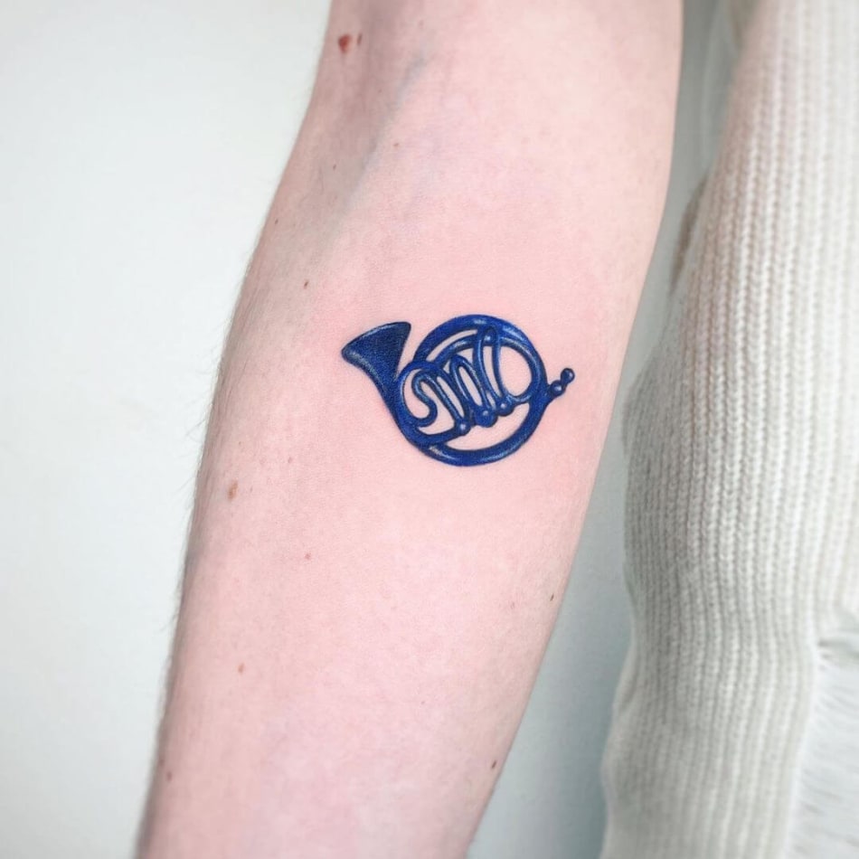 blue trompet music realism tattoo by Alice