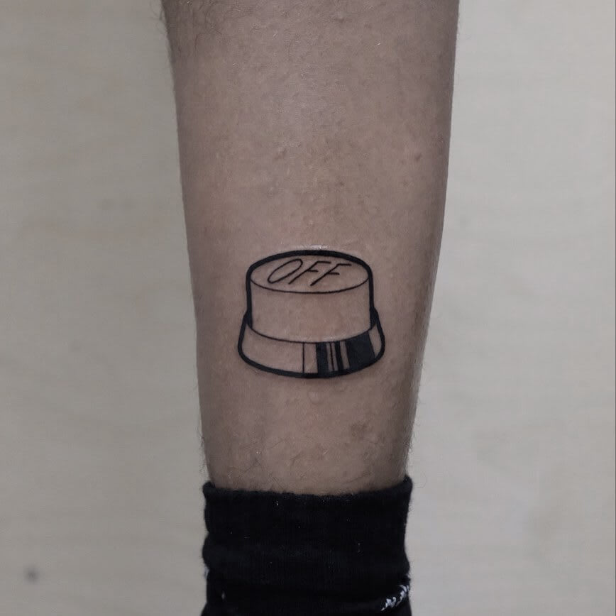 off button tattoo by B. Rixdorf