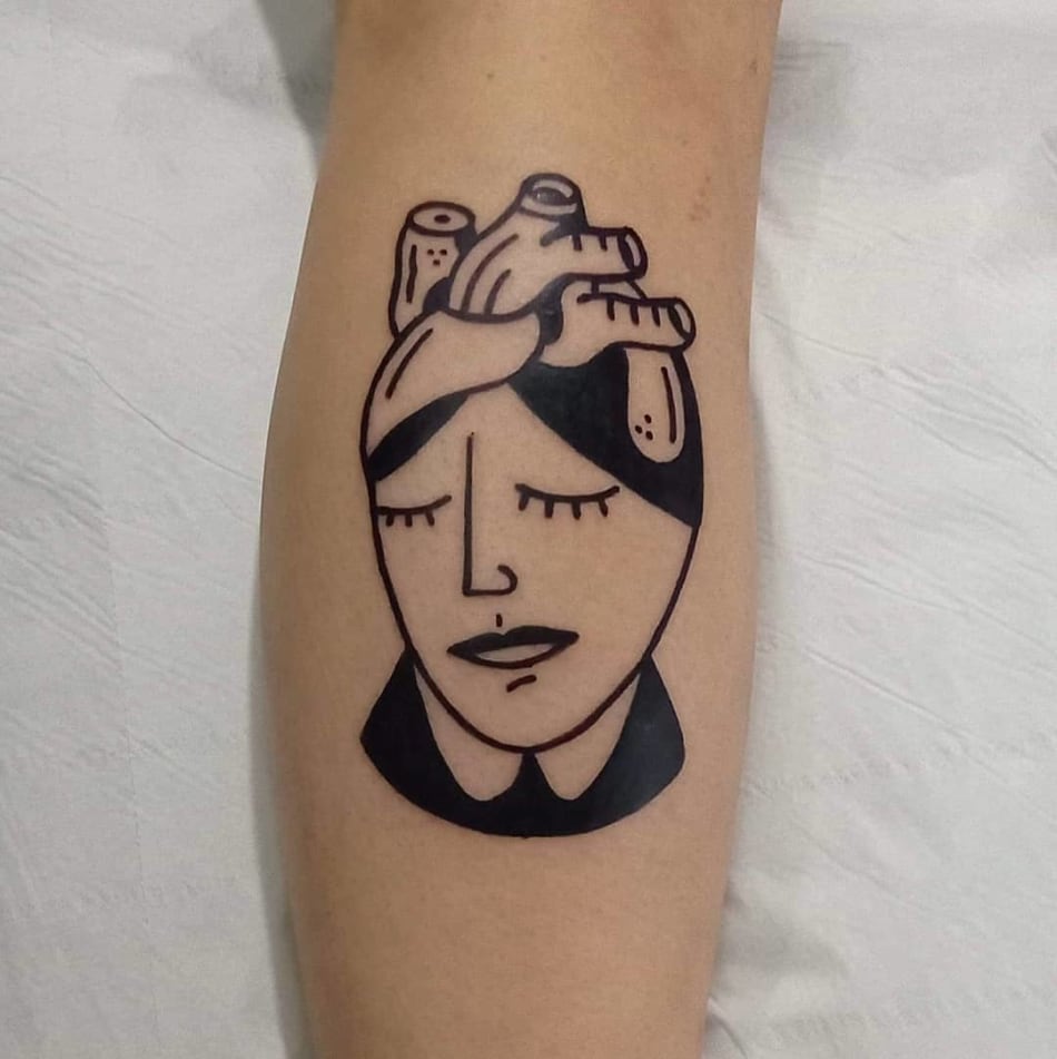 woman heart anatomic minimal tattoo by Benjamin Kluk