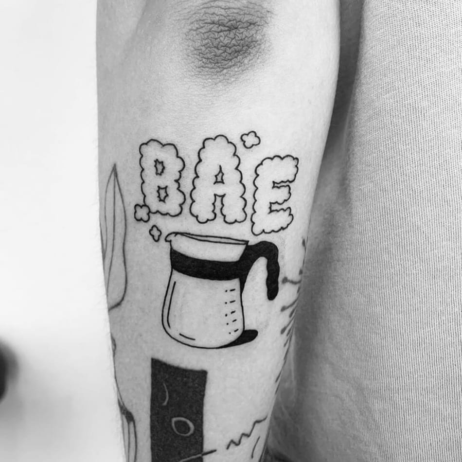 Tattoo of an old coffee pot with in clouds the word bae