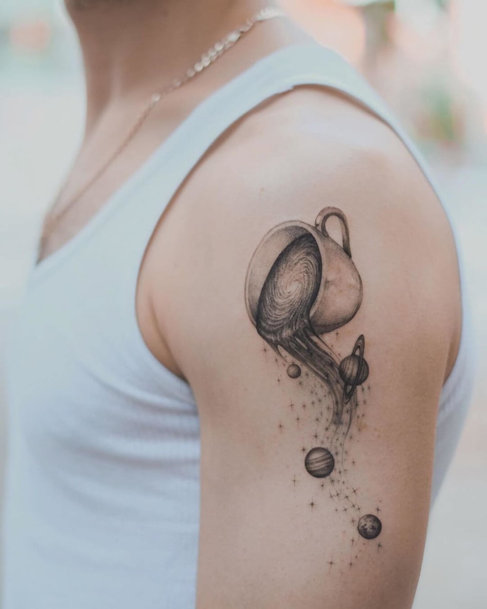 Tattoo of coffee poring into the milky way