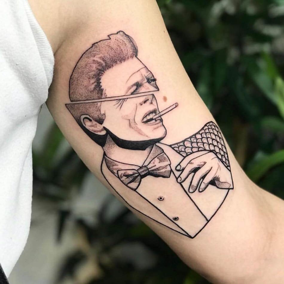 Minimal tattoo portrait of David Bowie split in two