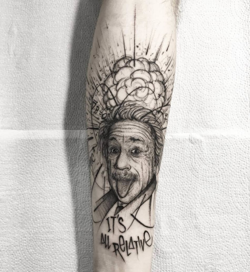 Tattoo portrait of Albert Einstein saying 'its all relative'