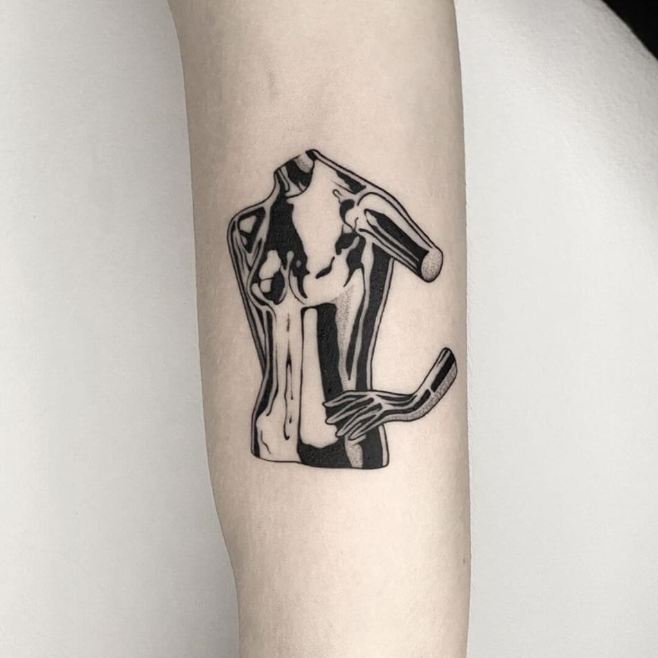 Chrome mannequin tattoo by Fimm tattooer