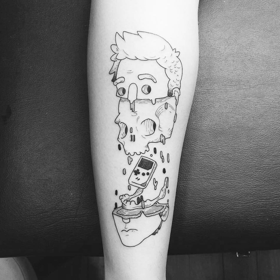 Game Boy within face and skull tattoo