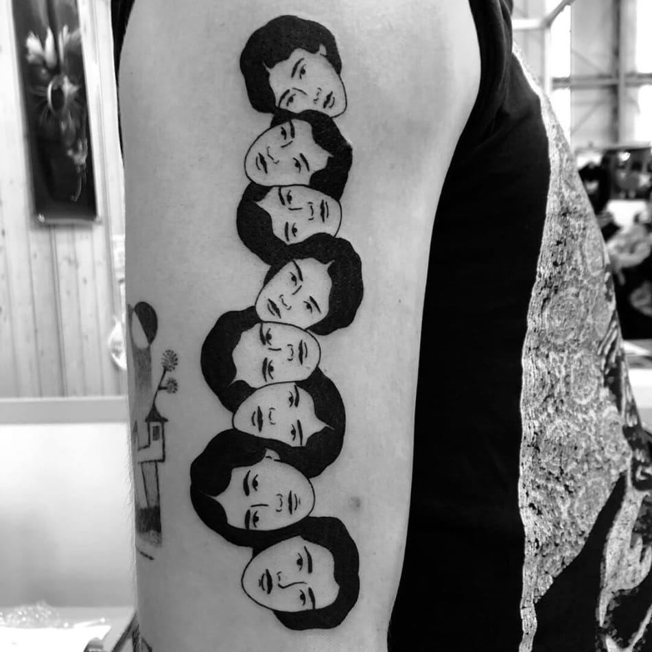 Adjoining heads by laracailletattoo