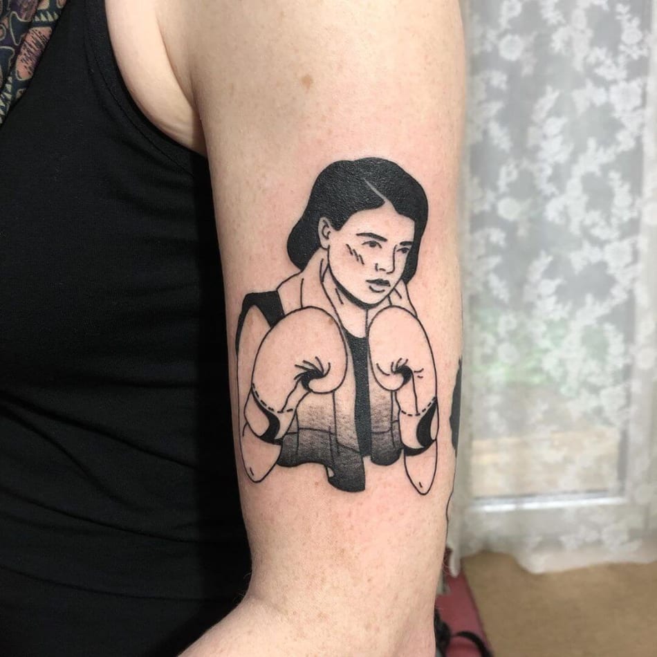 Boxing woman tattoo by laracailletattoo