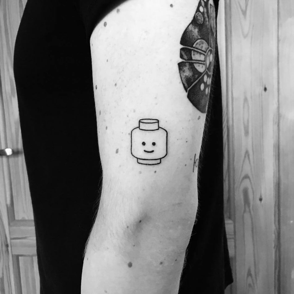 Lego figure head minimal black and white tattoo