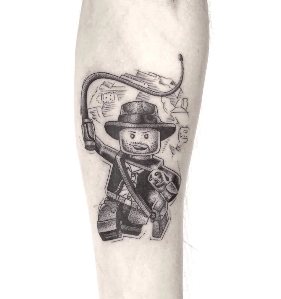 Lego figure without head tattoo