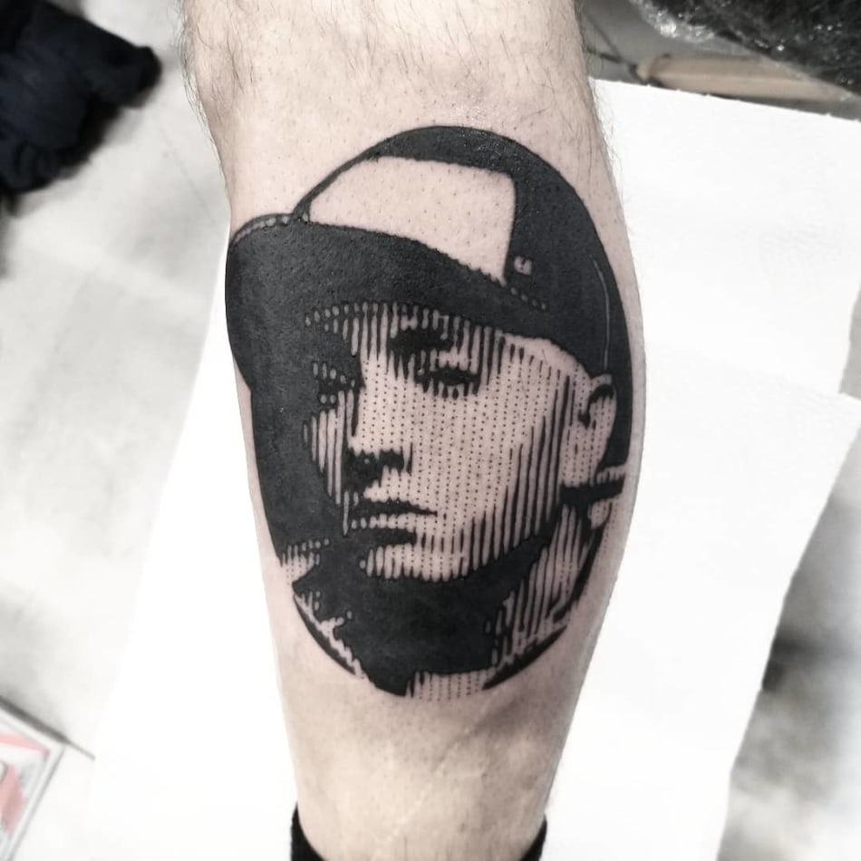 lined eminem portrait tattoo by Marco Bordi Tattoo