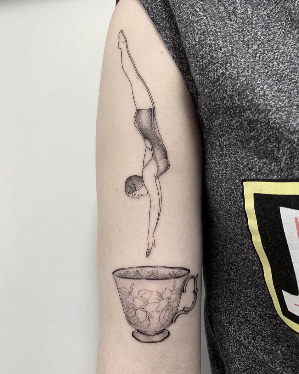 Michele Volpi Diving in a cup tattoo