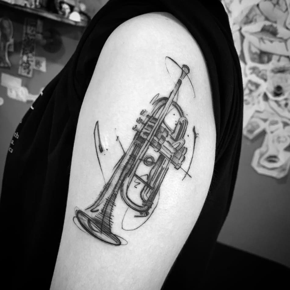 Tattoo of a trumpet in sketch style