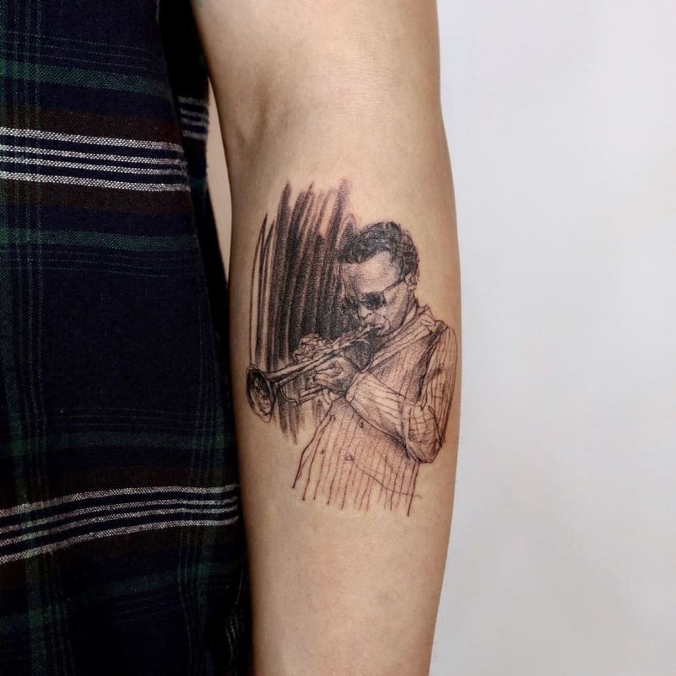 Sketch tattoo of a trumpet player