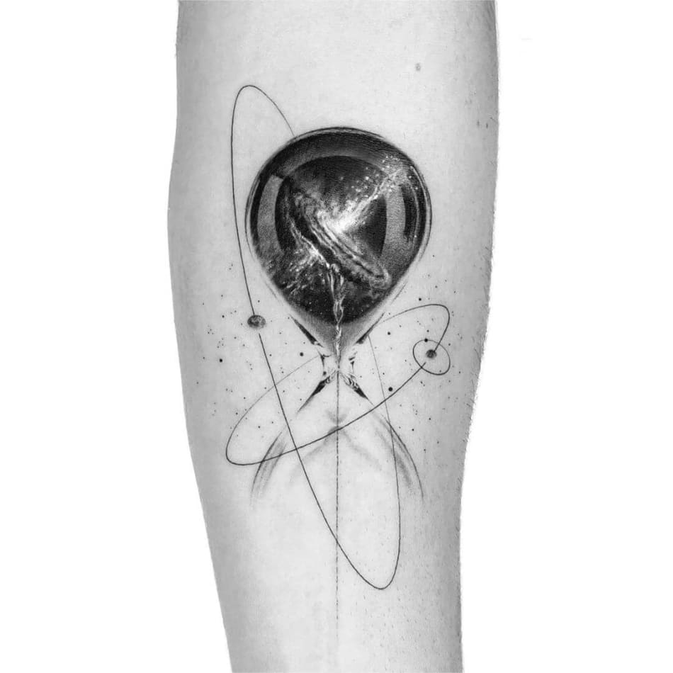 Time passing by in space tattoo by Peter Laeviv