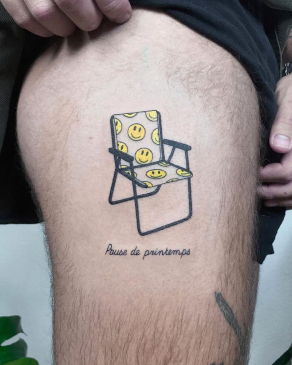 smiley chair tattoo by Randy Lahaie