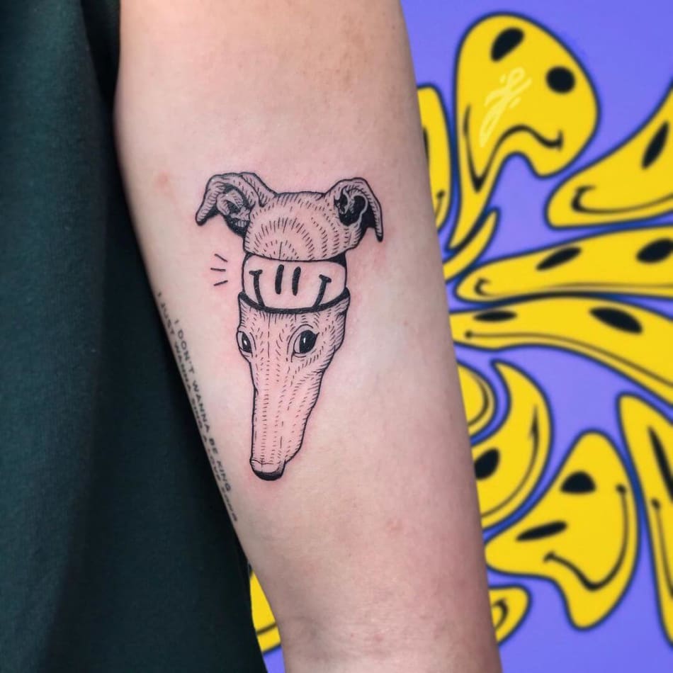 smiley in dog cartoon tattoo by SHAME