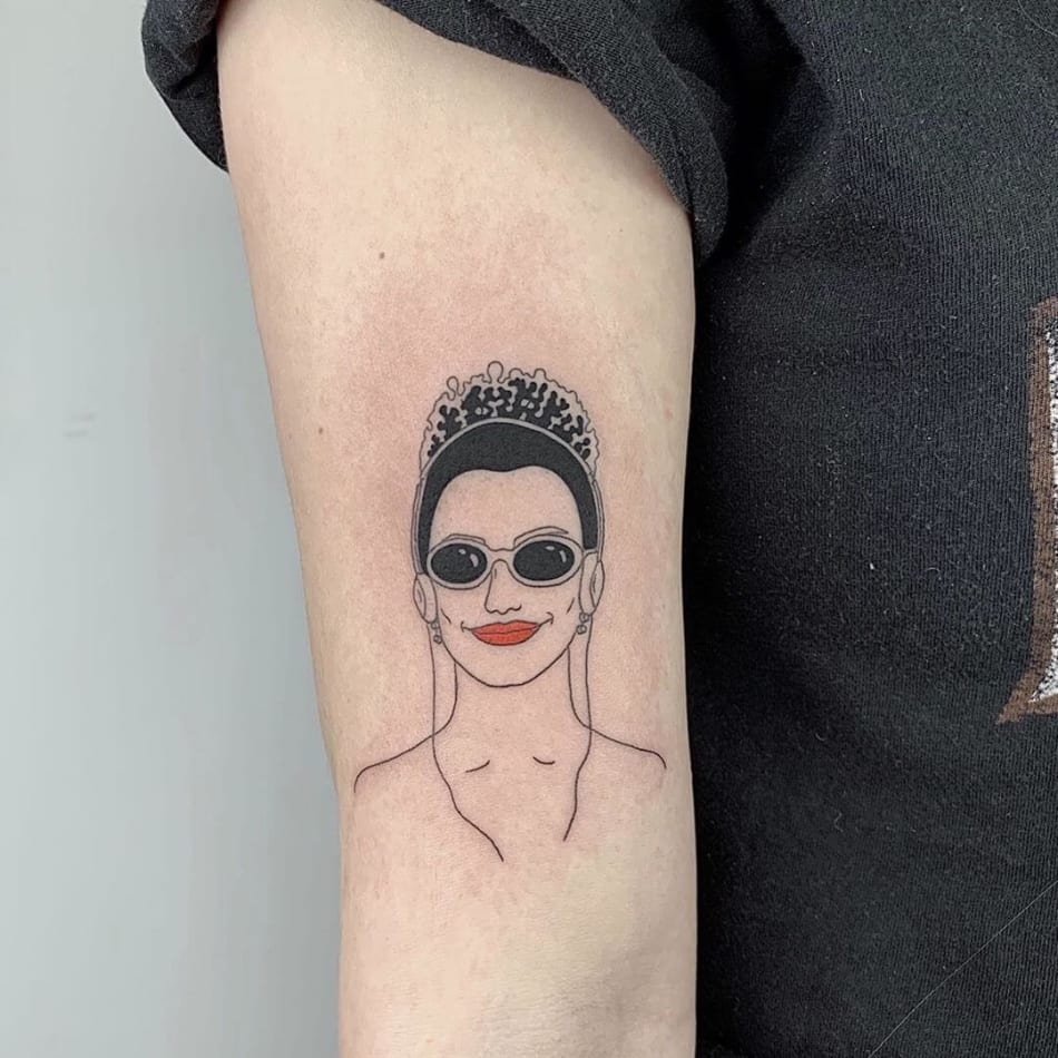 queen with headphones minimal tattoo by Sasha Butmaybe