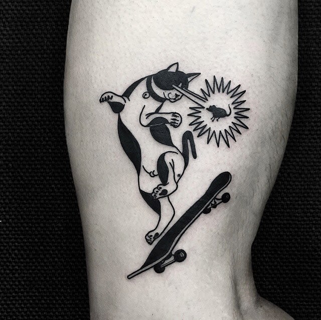 Cat on a skateboard tattoo