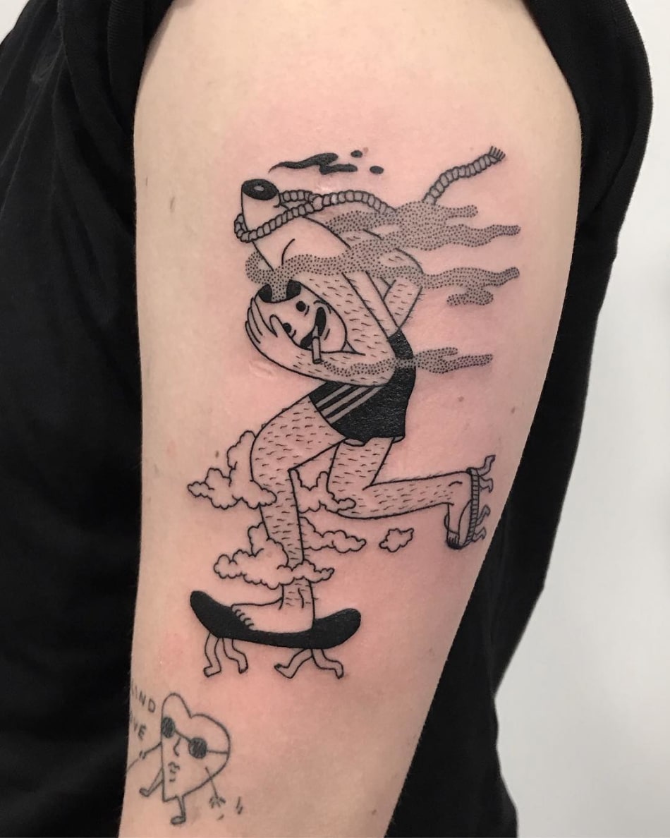 Illustrative tattoo of a character skateboarding
