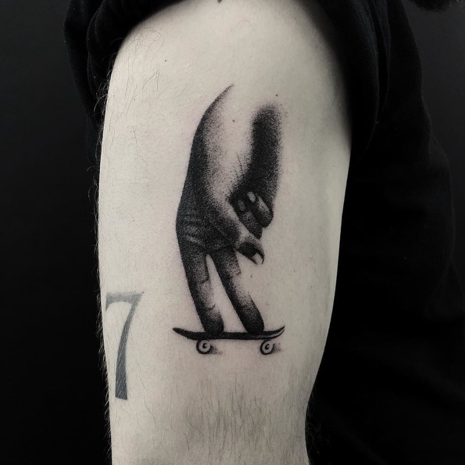 Finger skateboard tattoo