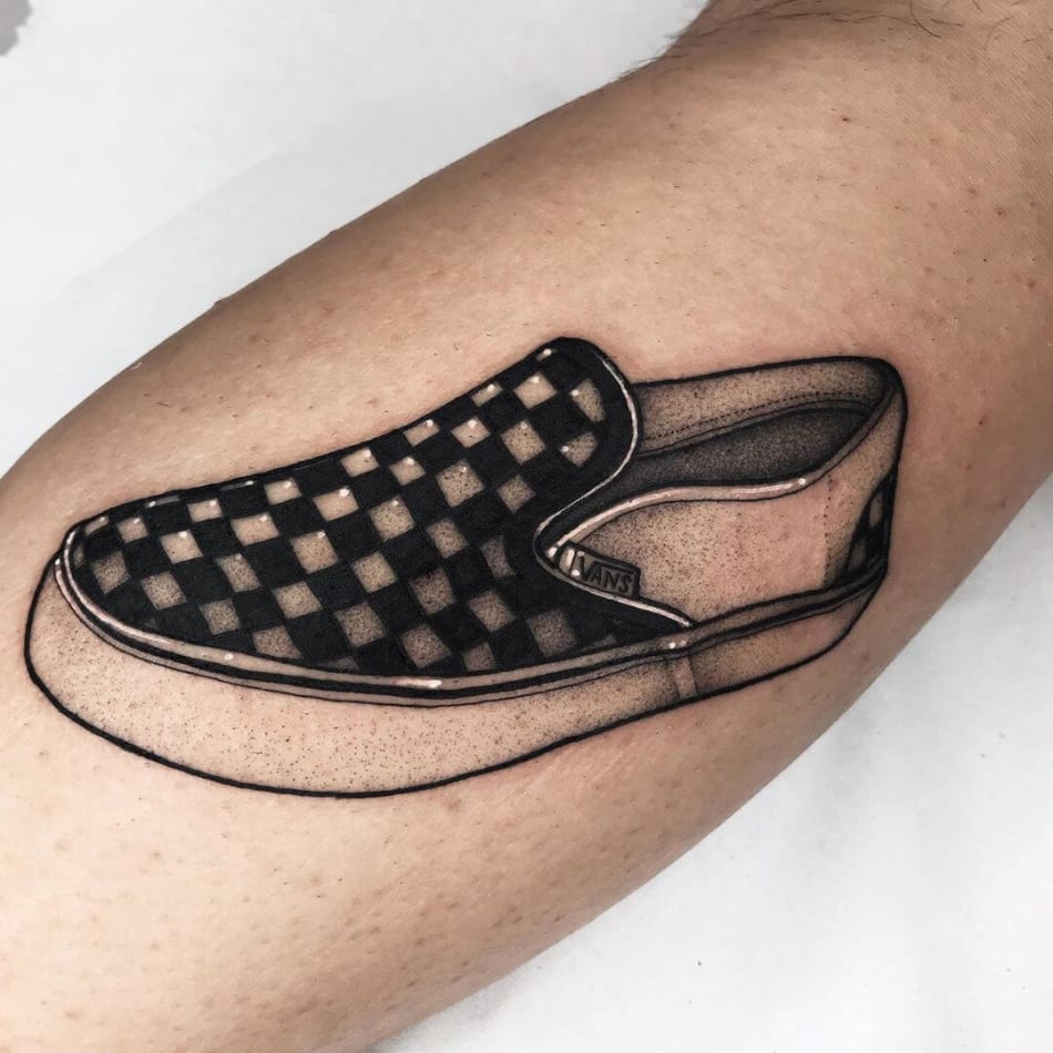 Tattoo of a Vans shoe with the famous checkerboard pattern