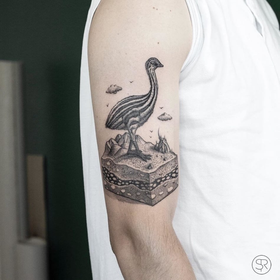 Historic bird on piece of earth tattoo by Sven Rayen