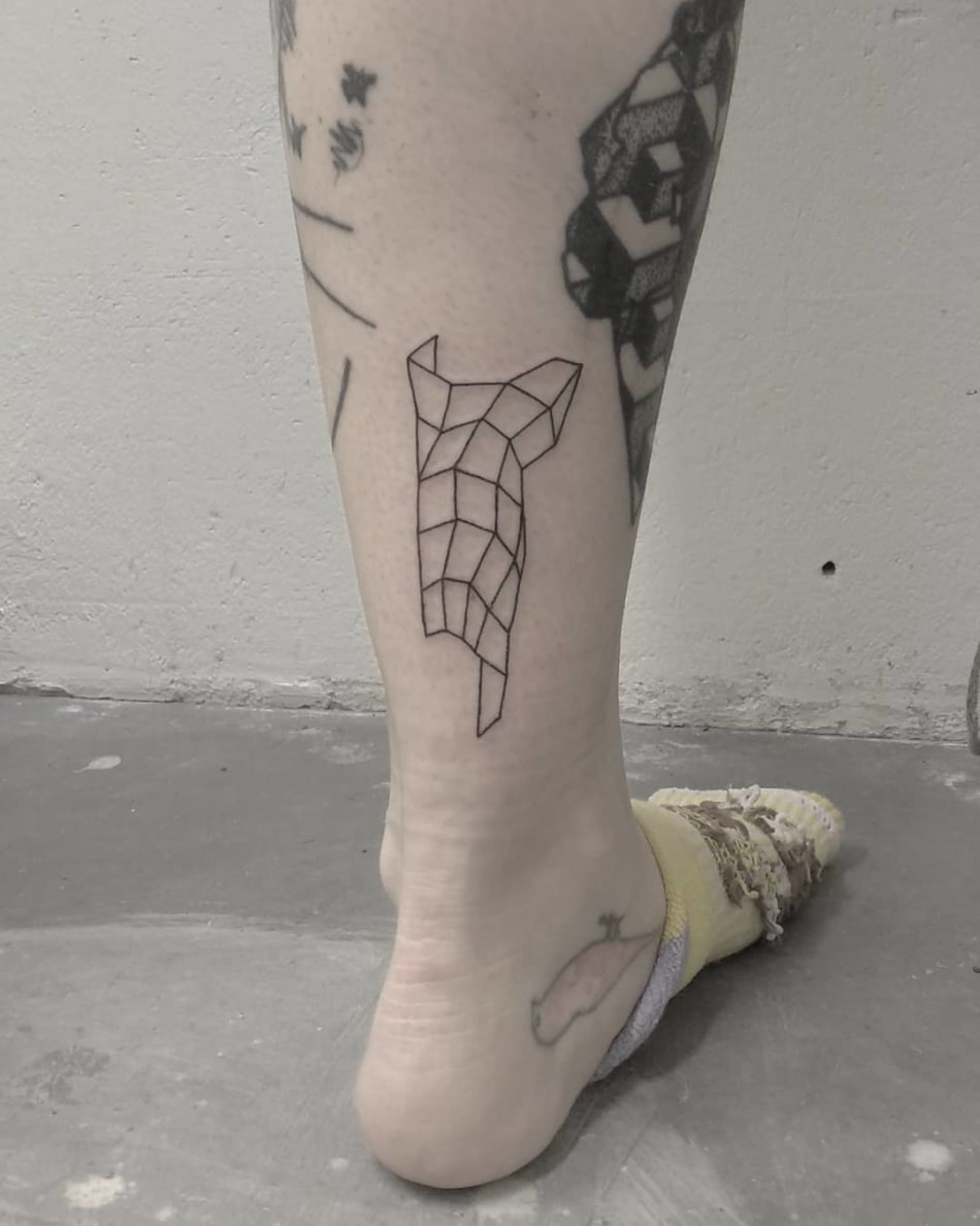 Geometric shape tattoo by Tattson