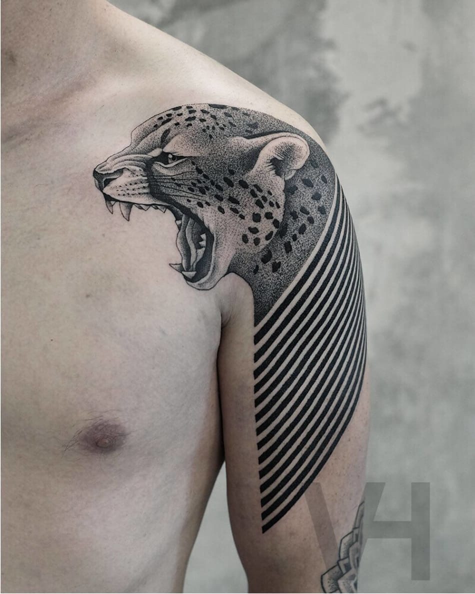 Cheeta shoulder tattoo by Valentin Hirsch