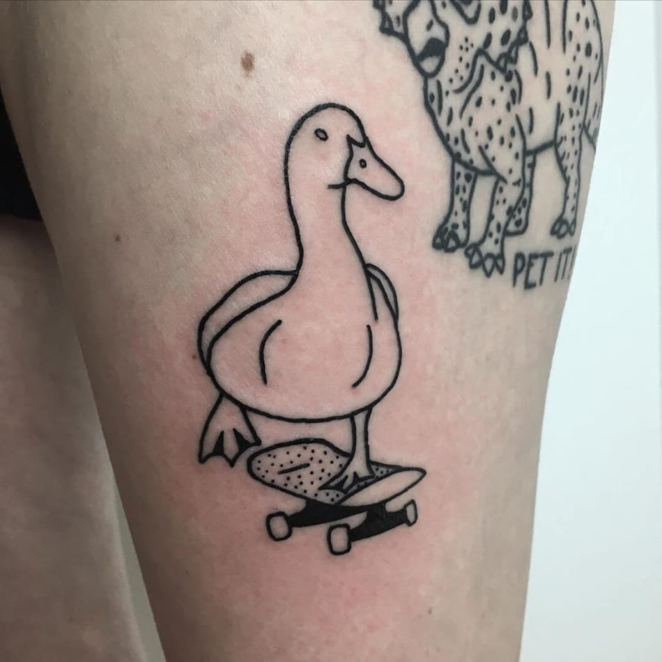 Duck on a skateboard tattoo by Violette Violence