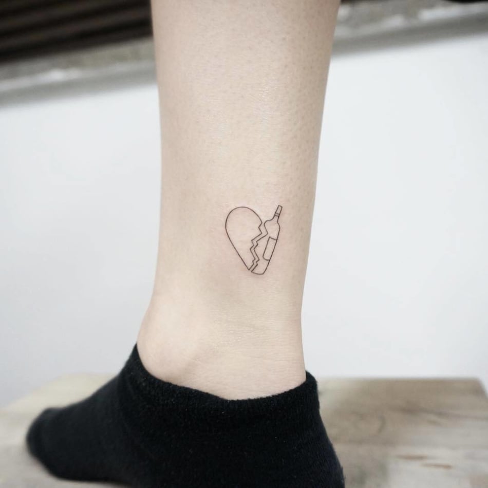 Broken heart wine bottle tattoo