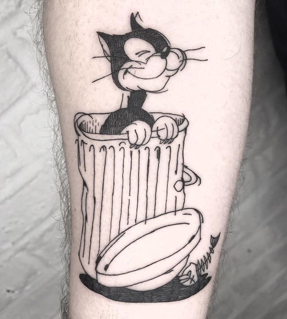 Cartoon cat in litter box tattoo