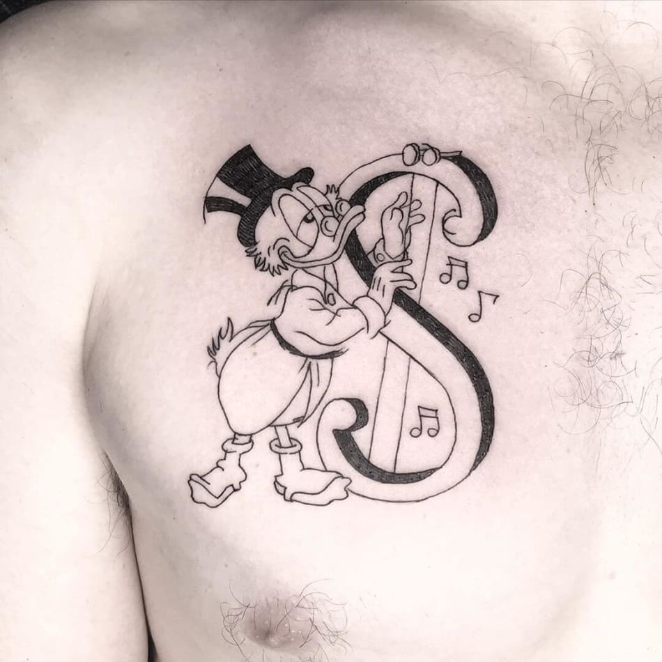 Tattoo of Dagobert Duck playing a money harp