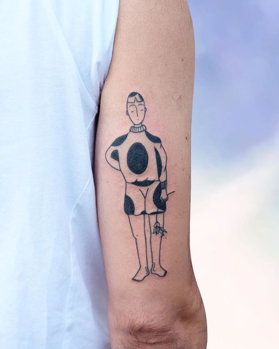 Character with dottd outfit tattoo