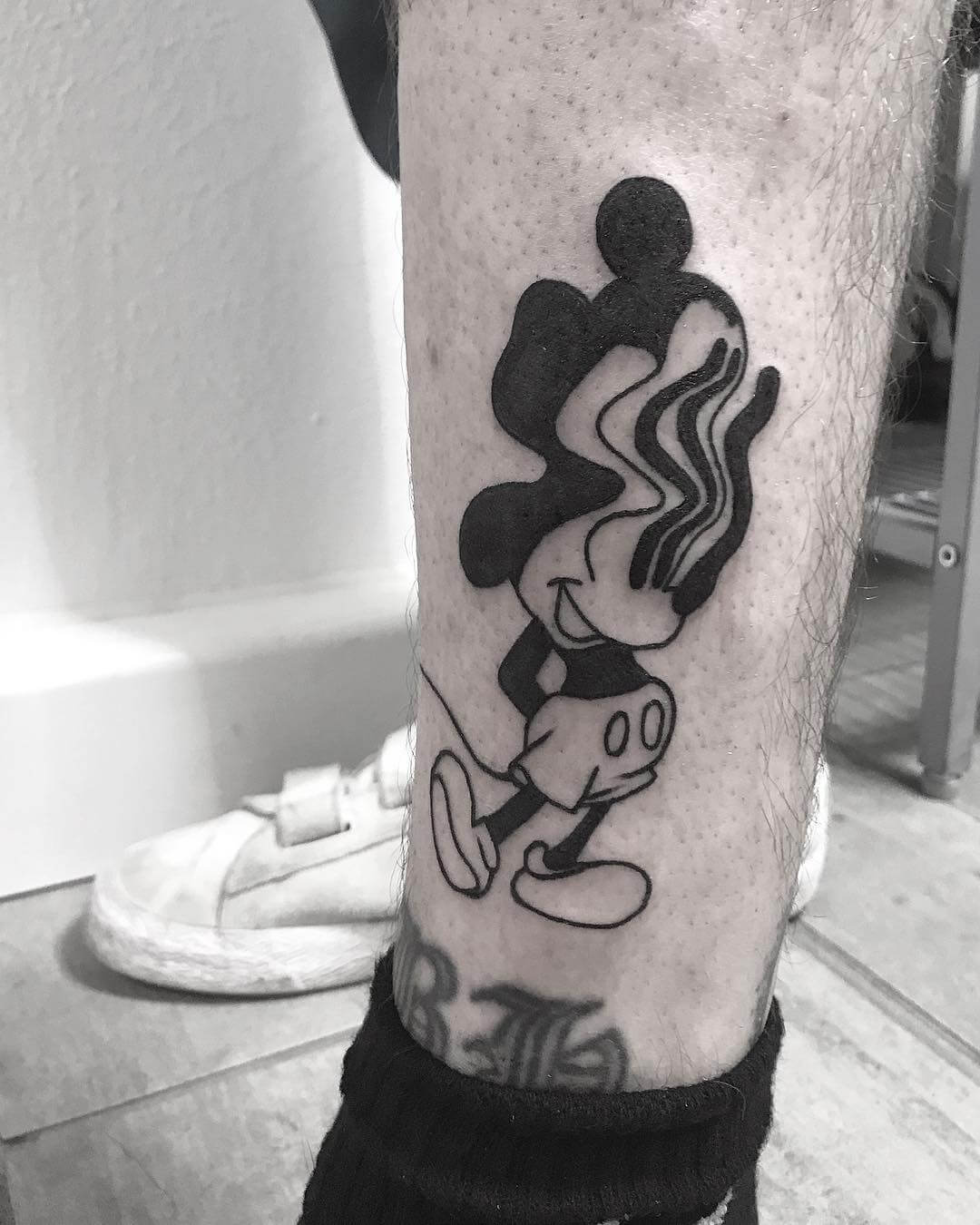 Mickey mouse distortion tattoo