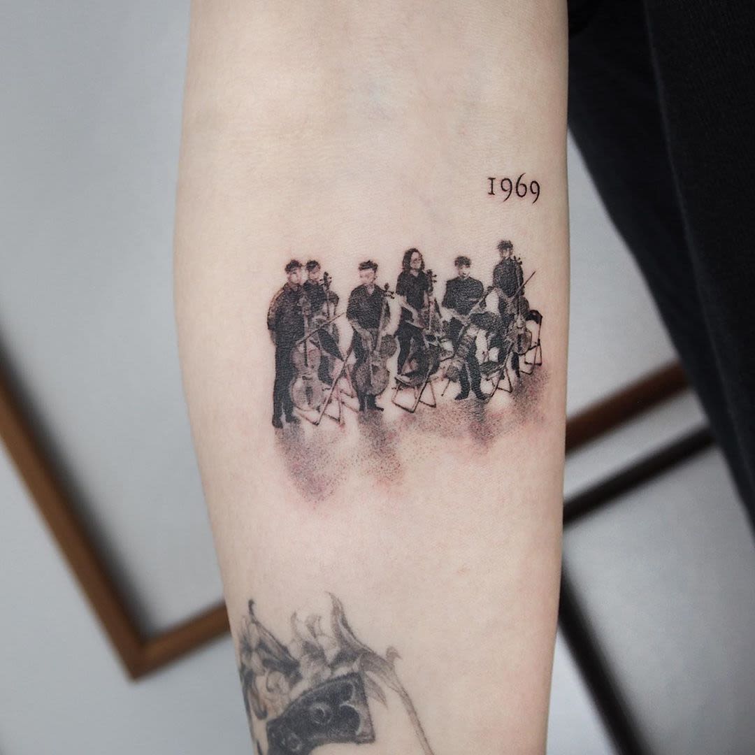 Tattoo dotwork of an orchestra