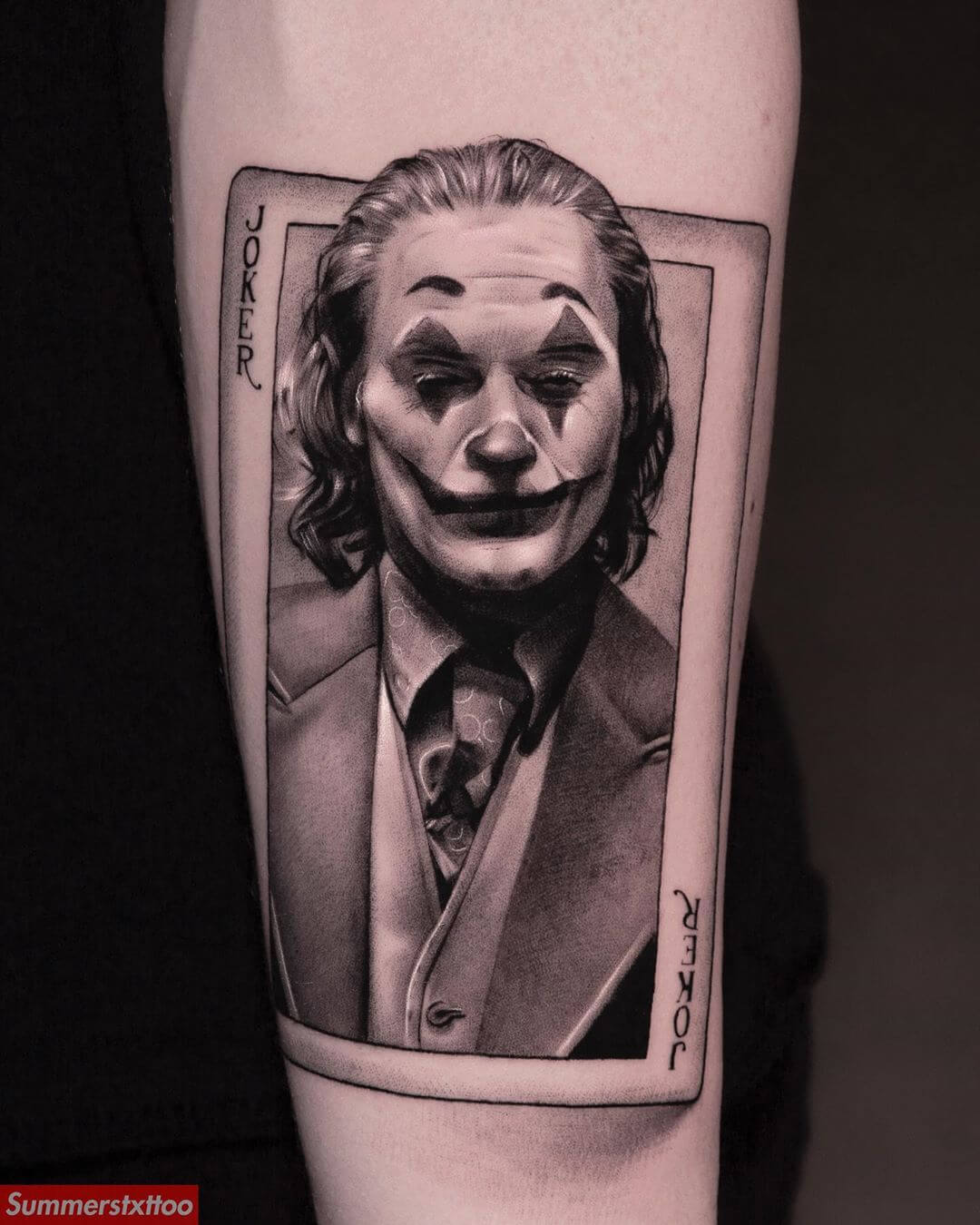 Tattoo portrait of Joaquin Phoenix as The Joker on a playing card