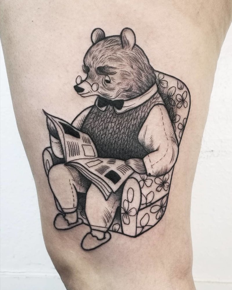 Illustrative bear reading tattoo