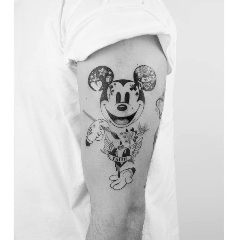 Mickey mouse painting a heart saying faith tattoo