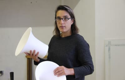 Me holding the ceramic bisque of some elements of my loudspeaker that is yet to be assembled, polished and glazed!