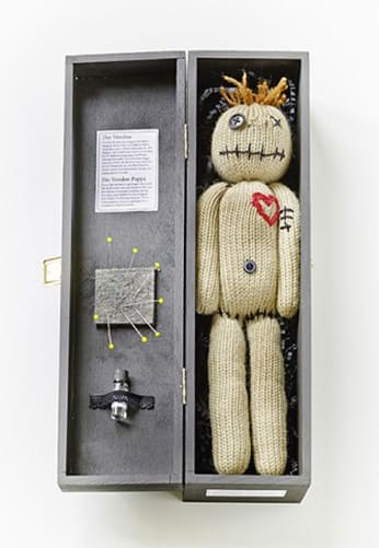 Hand knit voodoo doll from Knit Kit