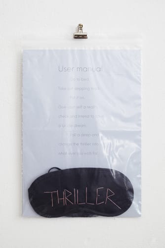 «THRILLER» (OBJECT), Paris 2012, Technique Object: hand embroidered, black sleeping mask, in transparent zip lock bag, with user manual on A4 cardboard, Format Object in packaging: 21 x 29,7 cm, Edition Object: 20 + 2 AP; © Sira-Zoé Schmid