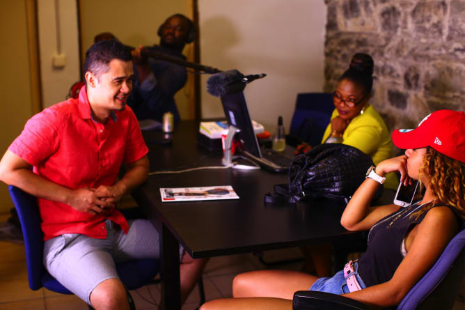 Filming in the basement of a money transfer agency at Rue de Montbrillant, behind Cornavin train station.