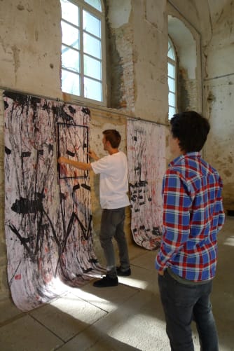 skateboarders Tobias and Philipp, choosing their «cut-outs» of sk8ART