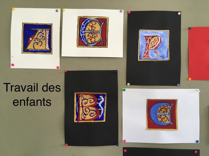 Illuminated initials of 10 year olds with natural pigments and egg tempera