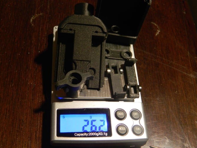 poids total en grammes (26.2), dimensions 73x20x40mm hors tout