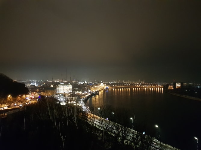 Look, how ardent she lies next to the strong river Dnipro.