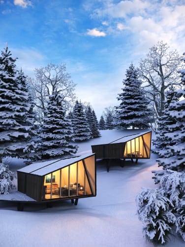 Foto di due eco-lodges in inverno