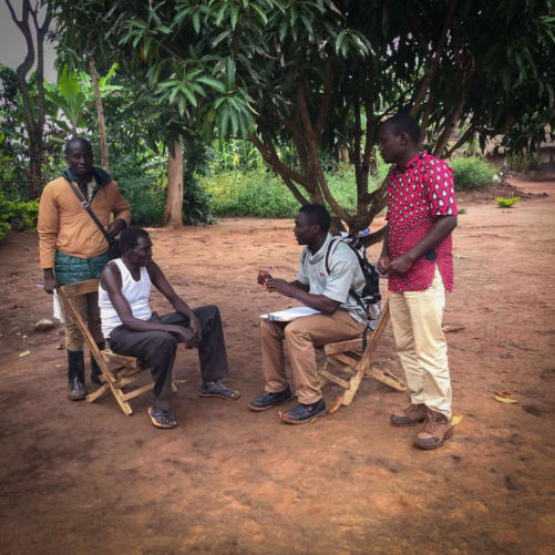 Brasio, Martin and Lauben with farmer Joseph.