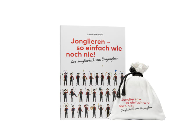 Ein starkes Duo: Buch mit passenden Jonglierbällen im Beutel